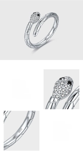 Macro view of S925 hallmark and pave-set zircons on sterling silver snake ring