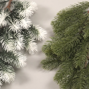Artificial Christmas pine teardrop decoration in natural green and snowy white finishes