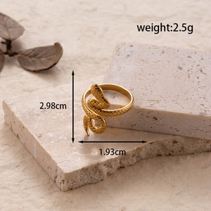 Adjustable gold snake ring in stainless steel with textured scales and dimensions