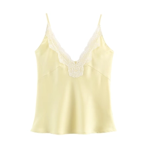 Pale yellow lace trim satin camisole with silk texture and V-neckline on white background