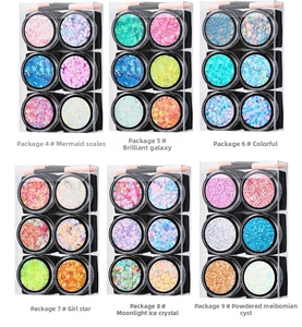 Set of six glitter eyeshadow gels with star and round sequins for stage makeup