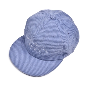 Detailed view of lavender corduroy baseball cap with white cactus letter embroidery