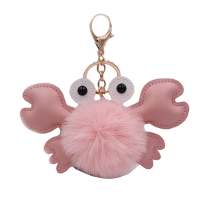 Cute pink plush crab keychain with furry ball body and golden metal ring clip