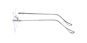 Close-up of rimless silver glasses frame featuring intricate cross floral engravings on temples