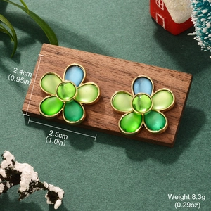 Detail view of flower earrings with blue-green gradient petals and size measurement info