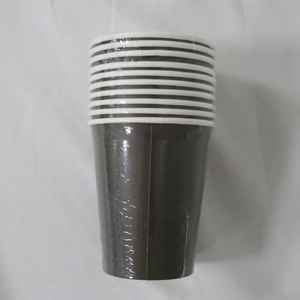 Close-up of a stack of black disposable paper cups wrapped in clear plastic film