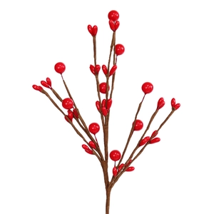 Close-up of artificial red berries on brown stems for festive home decor and floral DIY