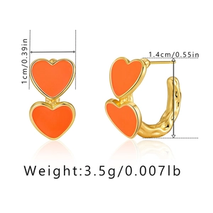 Detailed view of orange heart stud earrings showing dimensions and side thickness