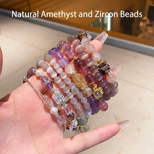 Handcrafted layered natural amethyst and zircon beaded bracelet with golden charms