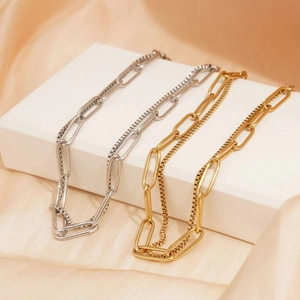 Elegant gold and silver double-layered stainless steel chain bracelets on silk