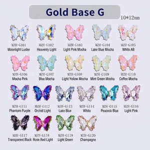 Cuadrícula de dijes de mariposa de cristal para uñas en 22 colores con bases doradas