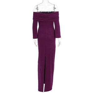Detail view of the back slit on a dark purple off-shoulder knitted bodycon dress