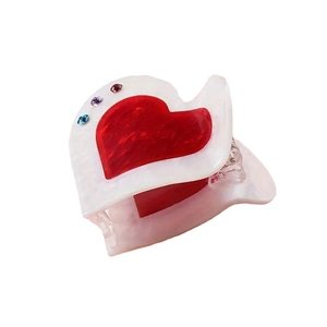 Acrylic heart hair claw clip with marble red pattern and sparkling rhinestone accents