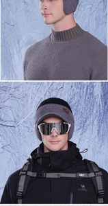 Detail of winter knit baseball cap with ear flaps and warm lining for outdoor cycling