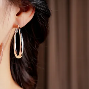 Polished silver U-shaped geometric drop earrings for women with minimalist style