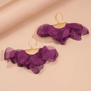 Detailed shot of purple chiffon flower earrings with golden metal semi-circle accents