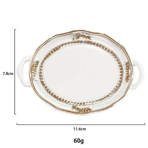 Detail view of oval white resin jewelry tray with gold trim and size dimensions 11.6x7.8cm