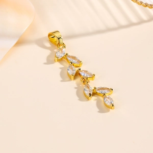 Elegant 18k gold plated wheat leaf pendant featuring sparkling marquise cut zircons