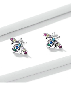 Macro shot of silver bee earrings featuring vibrant multi-color zircon stones for a refined look