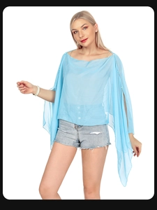 Detail view of light blue chiffon sun protection shawl with pearl accents and irregular hem