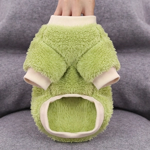 Detail view of a soft lime green fleece pet sweater with cozy ribbed cuffs for small dogs