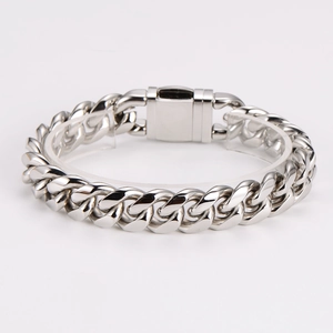 Polished silver stainless steel Cuban link bracelet for men with square clasp on stand