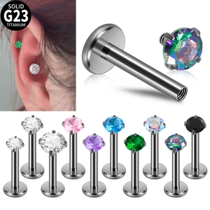 Detail of G23 titanium flat back stud featuring 4-prong set multicolor zircon stones