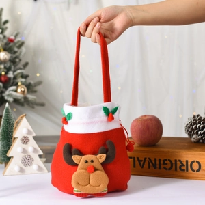 Detail of Christmas reindeer gift bag with 3D plush deer and green leaf embroidery