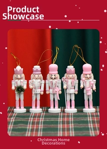 Detailed set of five pink Nutcracker wooden ornaments with Christmas floral and candy motifs