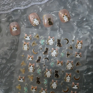 Cute bronzing cat nail stickers with gold butterfly and star patterns on pink cat eye base
