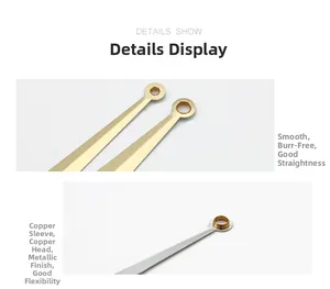 Detail of high-gloss gold and silver metal clock hands with precise copper sleeves