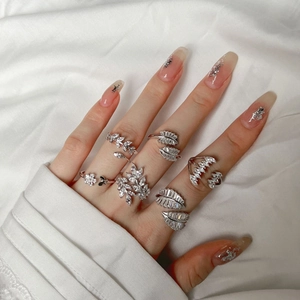 925 silver leaf and feather rings set with sparkling marquise cubic zirconia on hand