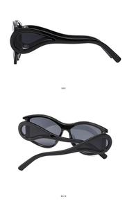Side and back view of oversized black Y2K sunglasses with streamlined geometric frames