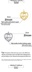 Detail of Mom heart pendants with cubic zirconia inlay in gold and silver plating