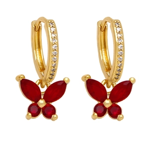 Elegant gold butterfly earrings with red crystals and small diamonds on white background