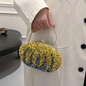 Chic pumpkin clutch bag with colorful rhinestones and round gold metal handle for evening