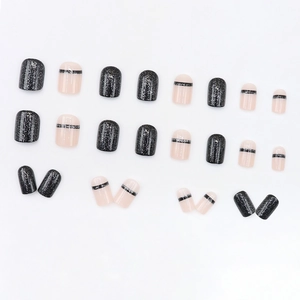 Short square press-on nails set with glitter black and silver linear art design