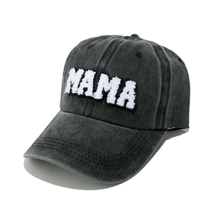 Washed dark grey cotton baseball cap featuring white MAMA chenille embroidery