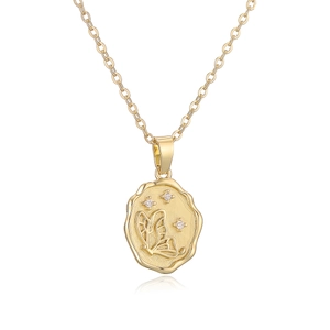 Golden butterfly geometric pendant necklace with sparkling crystals on an O-chain