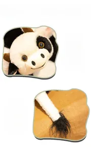 Detailed close-up showing soft plush fabric texture and quality stitching of the cow doll