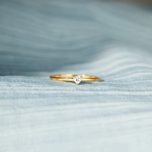 Minimalist S925 sterling silver ring featuring a golden heart-shaped zircon gemstone