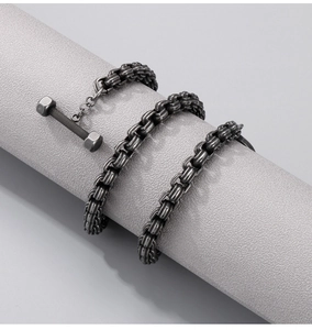 Detail of grey titanium steel barbell chain necklace with OT buckle for fitness fans