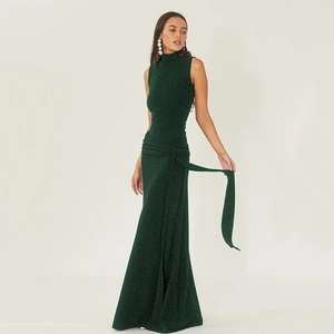 Detail of slim-fit sleeveless mermaid dress with shimmering metallic green fabric