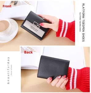 Front and back detail of a tri-fold women's wallet with black litchi texture and G buckle