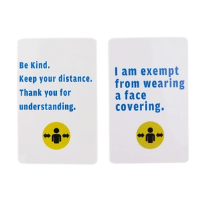 Detailed view of two white exemption cards with blue text and a sunflower distance icon