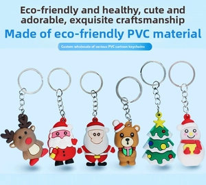 Detailed set of six Christmas cartoon PVC keychains including Santa and Reindeer