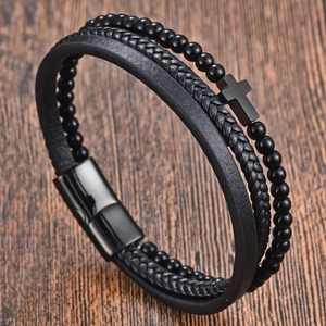 Men's minimalist black leather layered bracelet with obsidian beads and cross pendant
