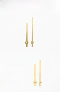 Detail view of model 990 gold metal clock hands including hour and minute pointers