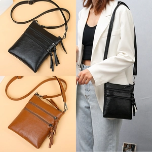 Women vintage PU leather crossbody phone bag with multi-zipper layers and tassels