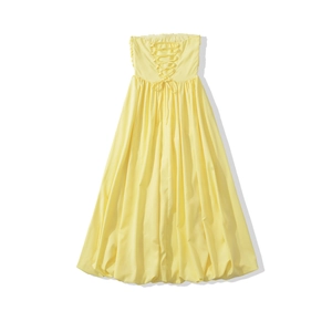 Back view of yellow strapless dress featuring an adjustable corset-style lace-up design